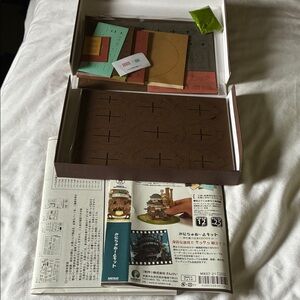 Sankei Howl’s Moving Castle Papercraft Kit.  New in packaging.